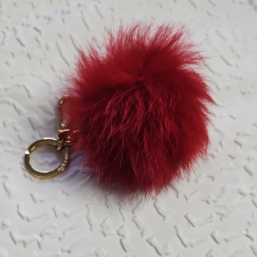 MICHEAL KORS BURGUNDY RED POMPOM KEY CHAIN